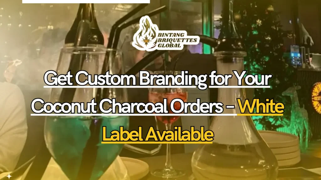 Custom branded coconut charcoal boxes neatly stacked on wooden pallets in a clean industrial warehouse.